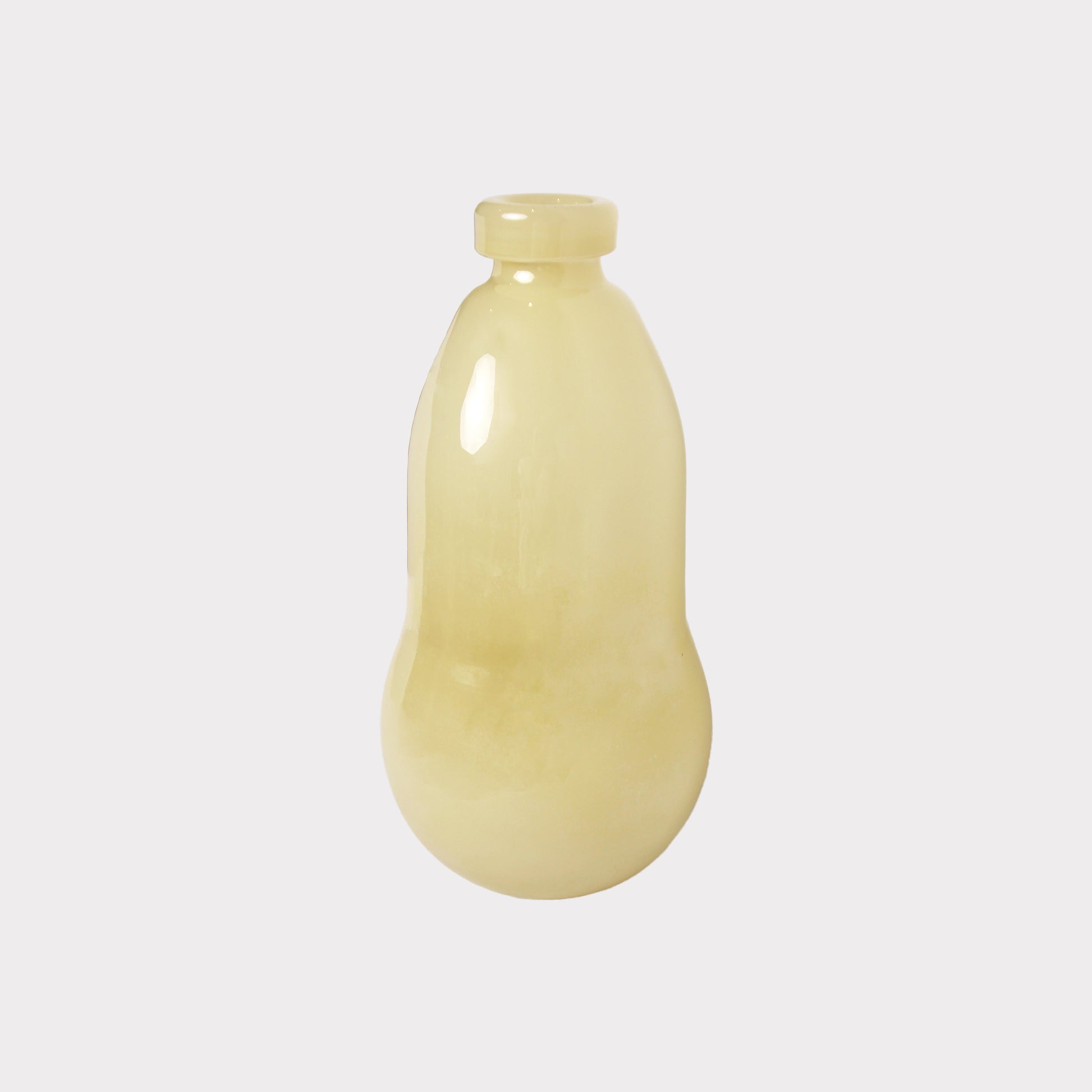 A light yellow gourd-shaped glass vase.