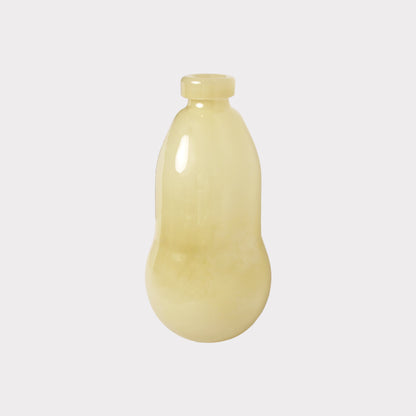 A light yellow gourd-shaped glass vase.