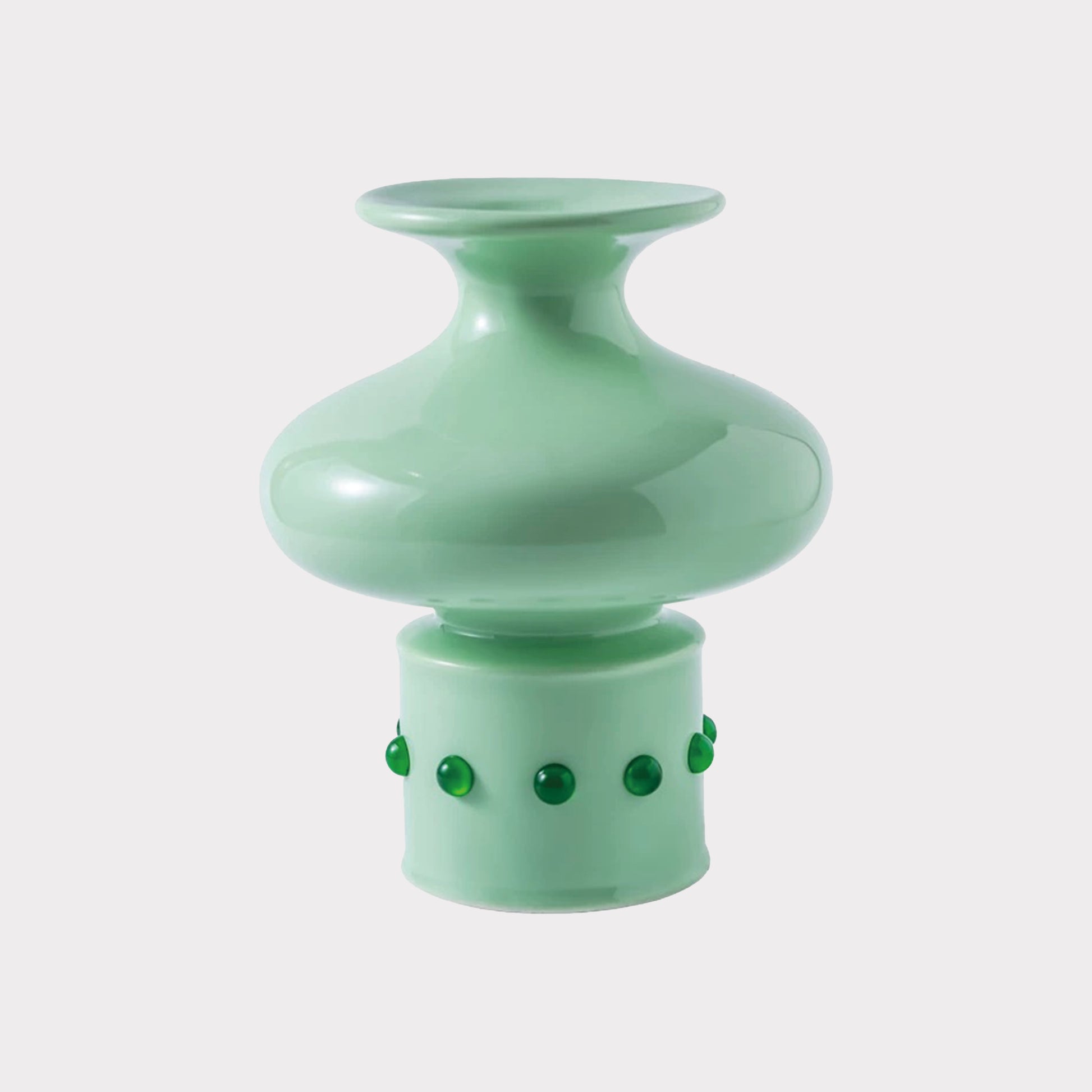A jade green vase with a classic Chinese bamboo joint design, featuring a green gemstone inlaid at the base.